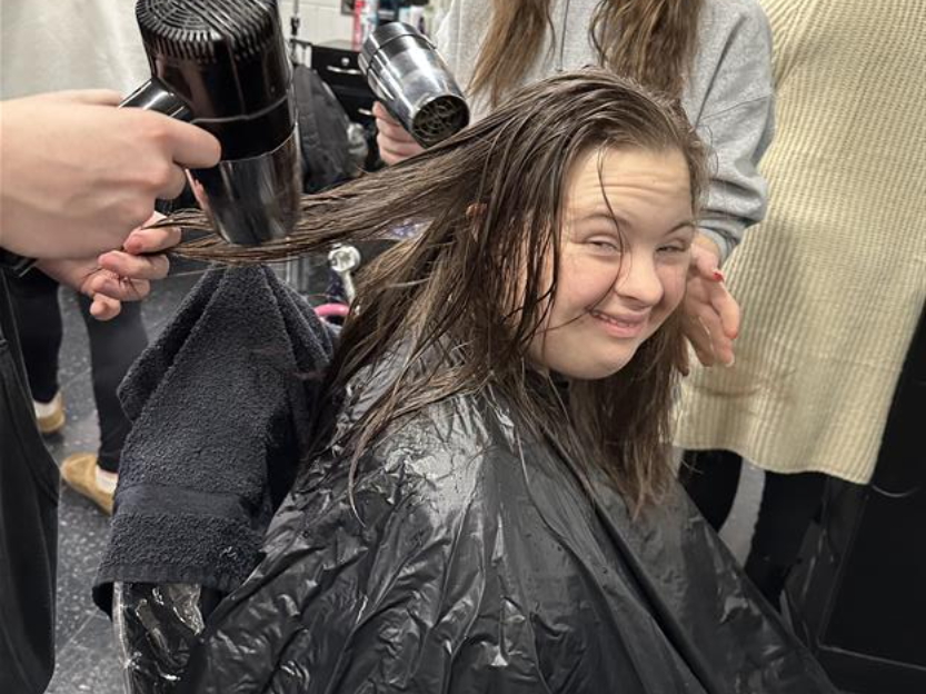 Centennial High cosmetology students style hair